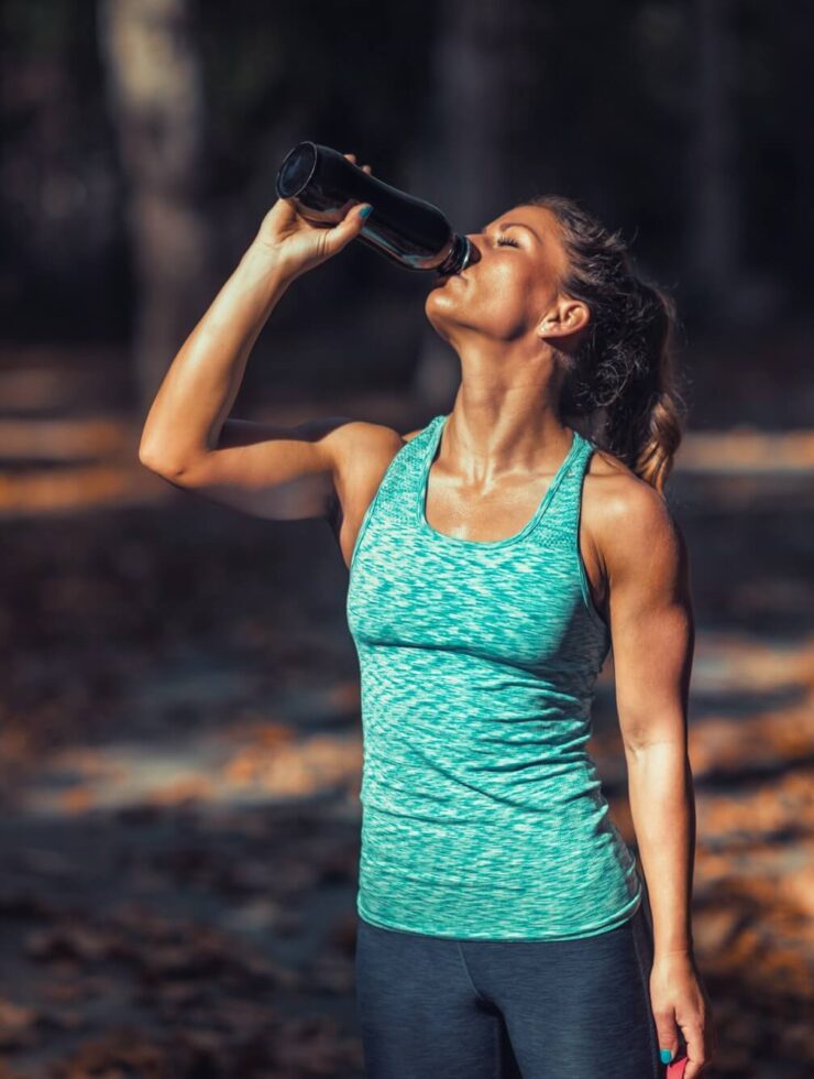 Woman Exercising Outdoors in The Fall