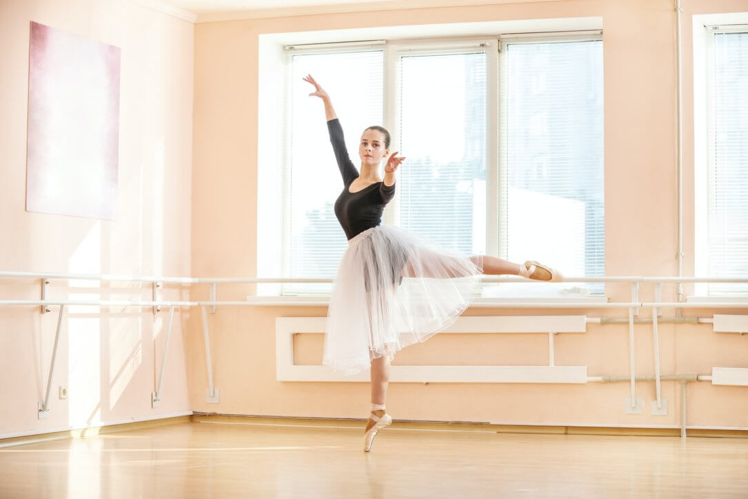 Young ballerina dancing on pointe